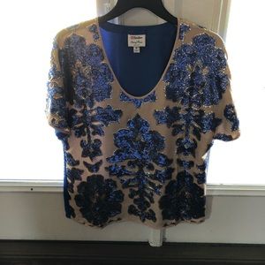 A blue Neiman Marcus blouse 👚